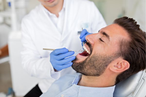 man having dental treatment