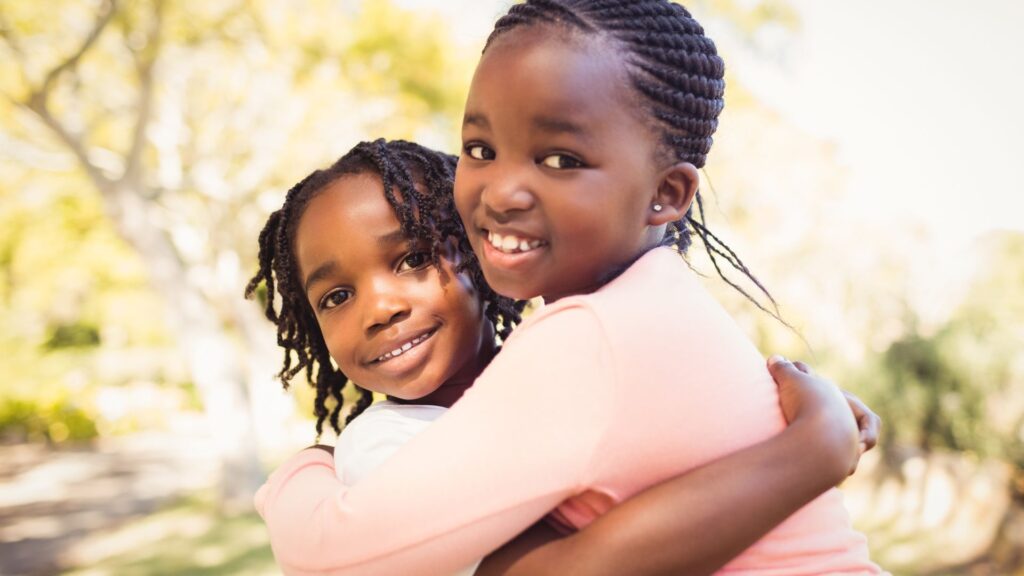 two girls smiling