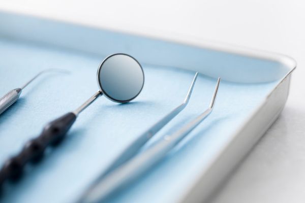 dental mouth mirror and tweezers